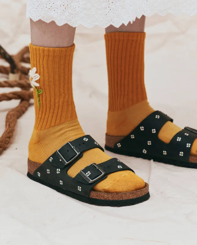 BIRKENSTOCK Arizona with Hand Painted Tooled Daisy. -- Black Oiled Leather with Cream sold by THE GREAT.