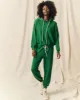 The Cropped Sweatpant. Solid -- Holly Leaf sold by THE GREAT.