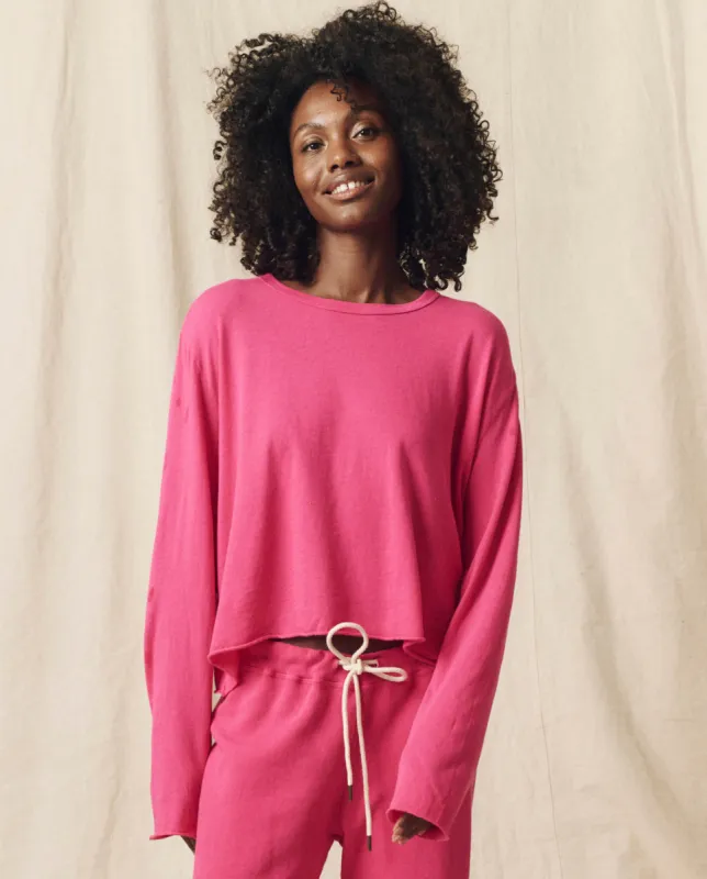 The Long Sleeve Crop Tee. Solid -- Fuchsia sold by THE GREAT.
