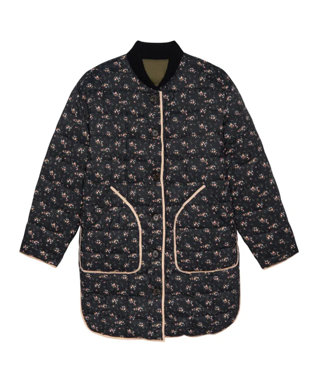 The Reversible Down Treeline Puffer. -- Wilderness Floral and Evergreen sold by THE GREAT.