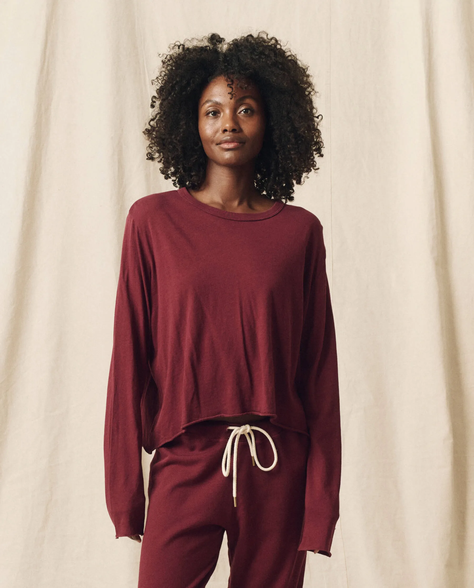 The Long Sleeve Crop Tee. Solid -- Mulled Wine sold by THE GREAT.