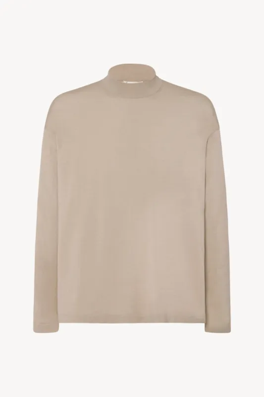 Delsie Mock Neck in Wool made by The Row