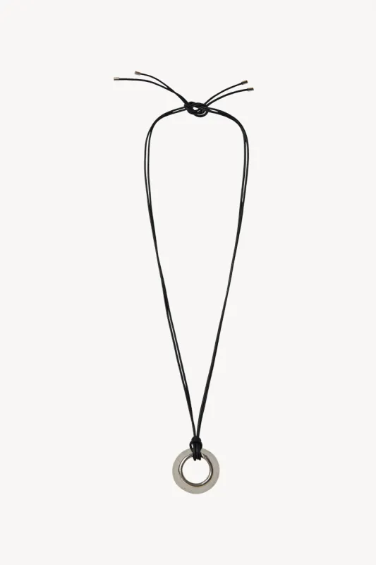 Pendant Necklace in Bronze sold by The Row