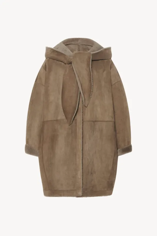 Parnasse Coat in Shearling Suede sold by The Row