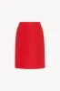 Corinna Skirt in Coated Wool sold by The Row