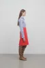 Corinna Skirt in Coated Wool sold by The Row