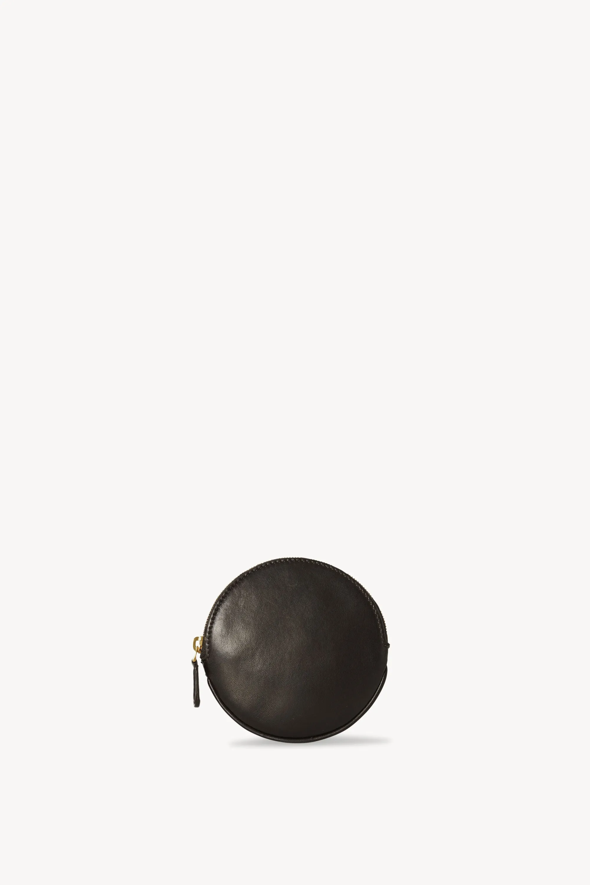 Round Pouch in Leather sold by The Row