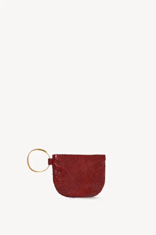 Geo Bracelet Clutch in Python sold by The Row