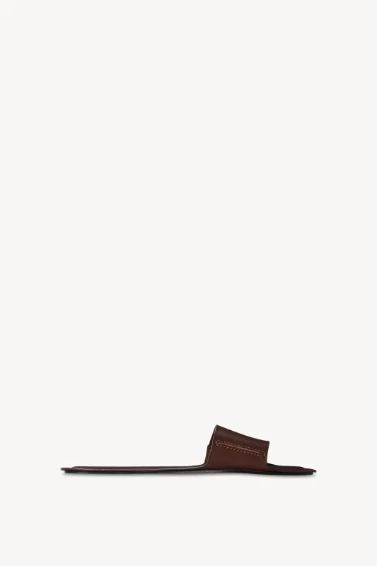 Sara Strap Slide in Leather sold by The Row