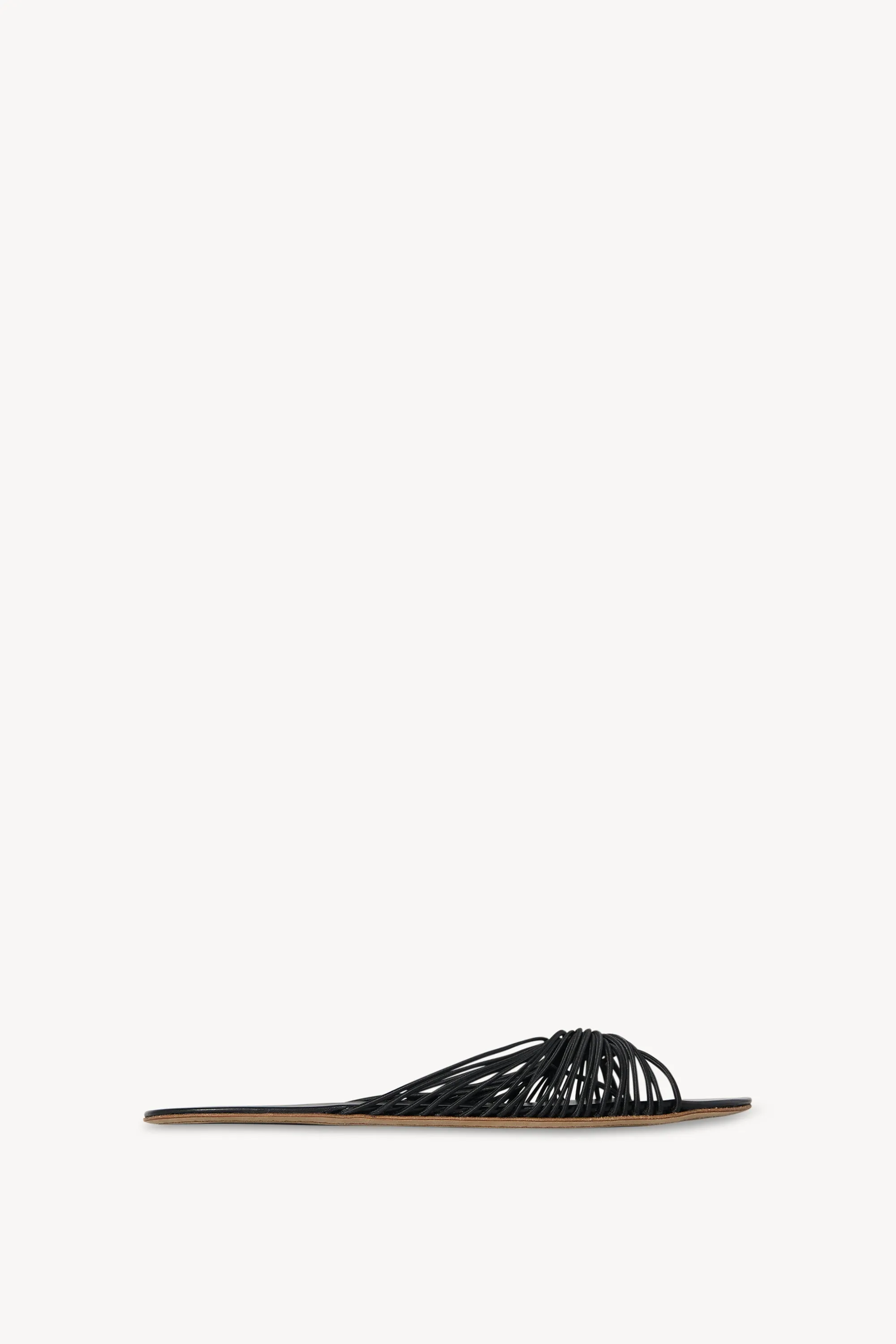 Sara Slide Sandal in Elastic and Leather sold by The Row
