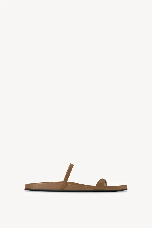 Hugh Thin Strap Slide in Leather sold by The Row