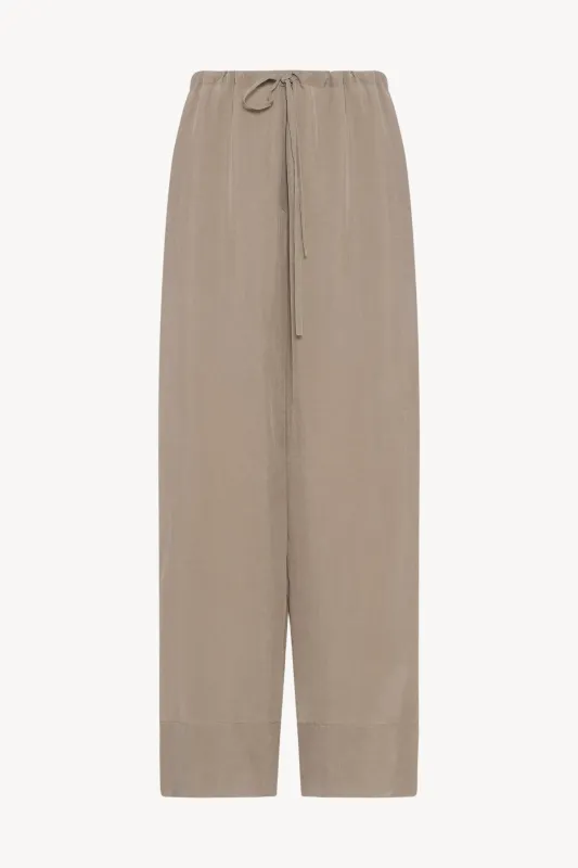 Enea Pant in Cupro sold by The Row