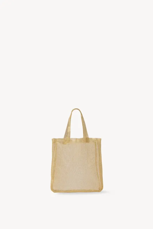 Imogen Mini Tote Bag in Brass sold by The Row