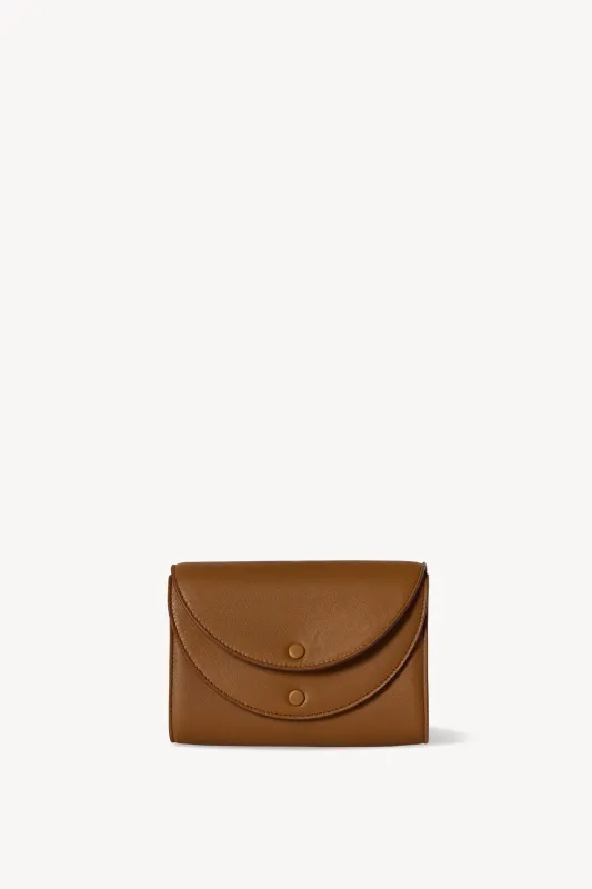 Double Flap Clutch in Leather sold by The Row