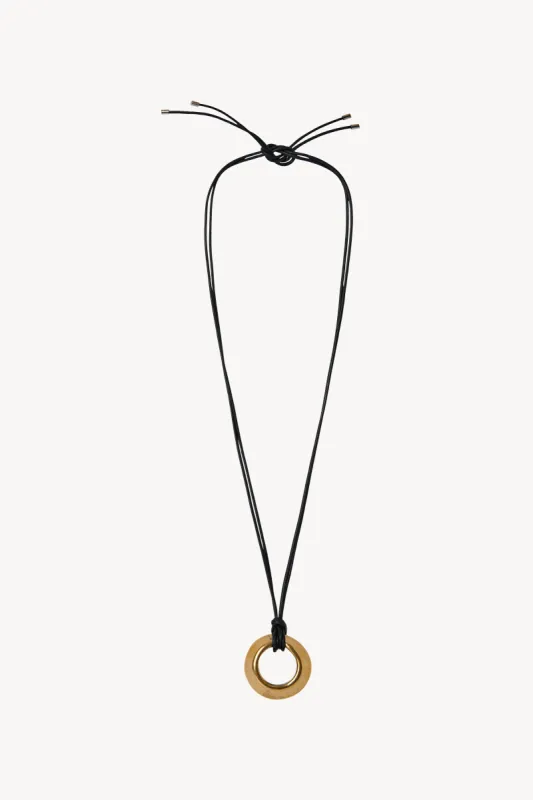 Pendant Necklace in Bronze sold by The Row