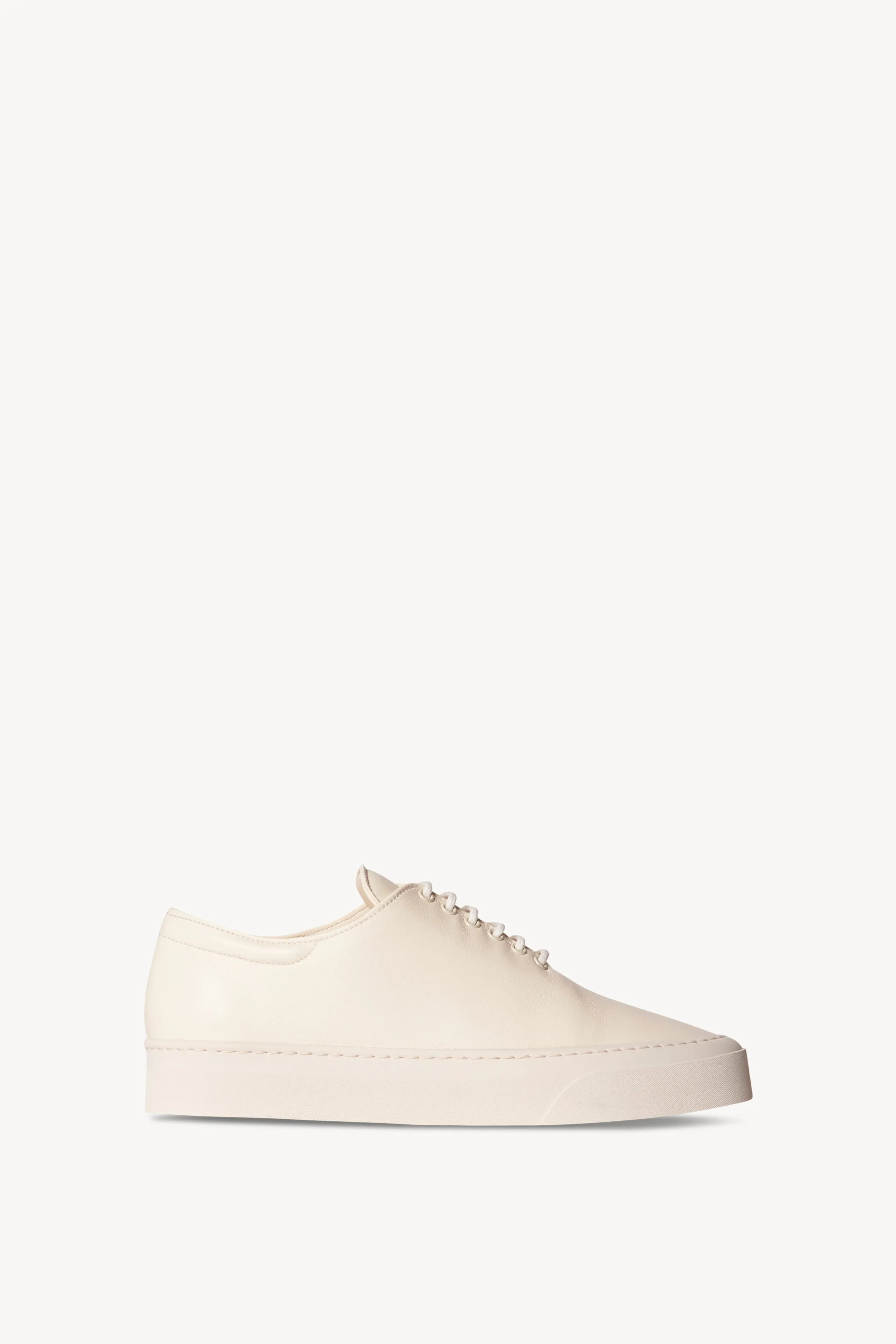 Marie H Lace-Up Sneaker in Leather sold by The Row