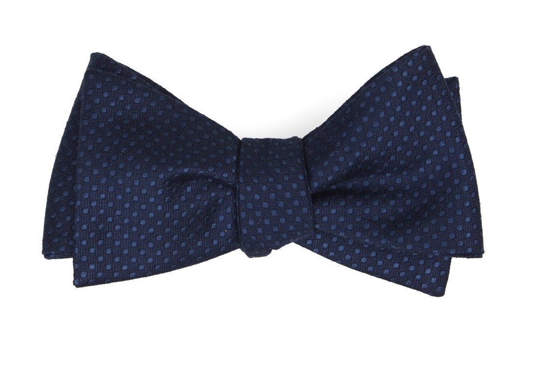 Dotted Spin Navy Bow Tie sold by The Tie Bar