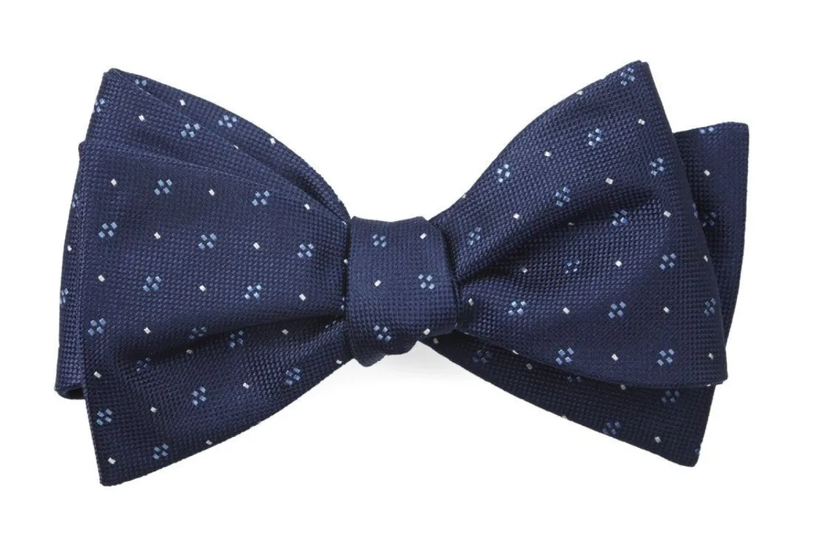 Geo Key Navy Bow Tie sold by The Tie Bar