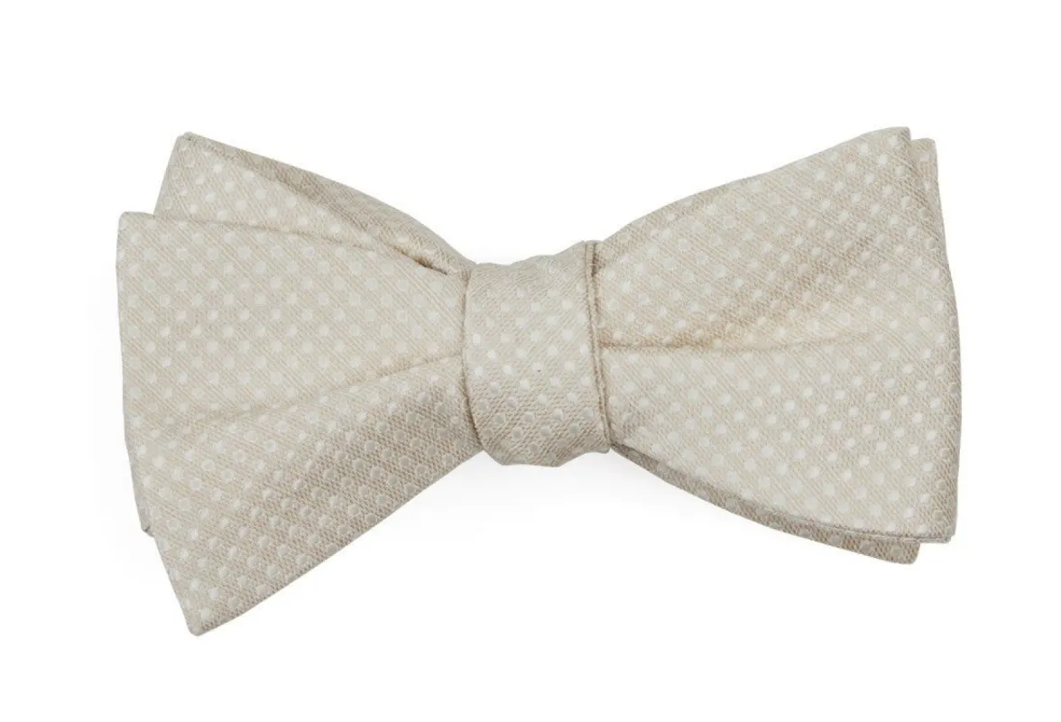 Dotted Spin Light Champagne Bow Tie sold by The Tie Bar