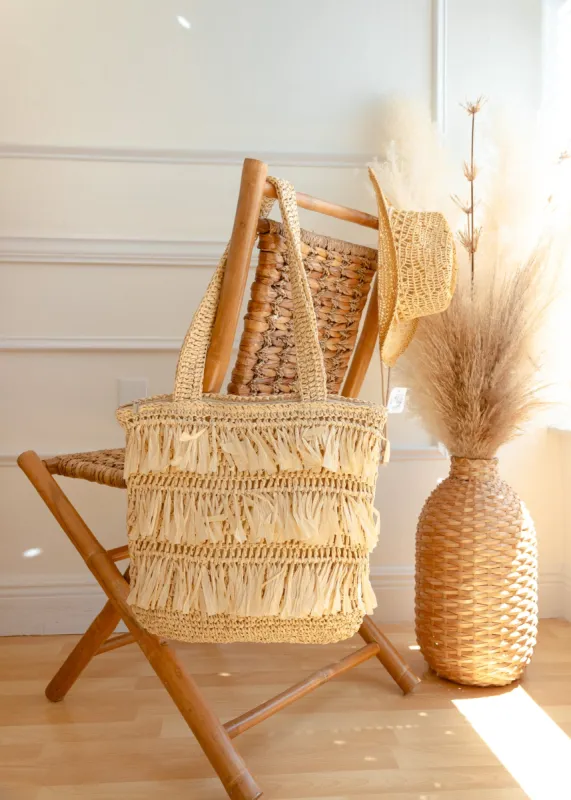 Island Villa Raffia Fringe Tote Bag sold by The Wanderlust Bazaar