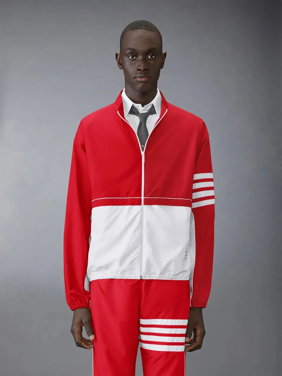 RIPSTOP 4-BAR COLOR BLOCK WINDBREAKER sold by Thom Browne