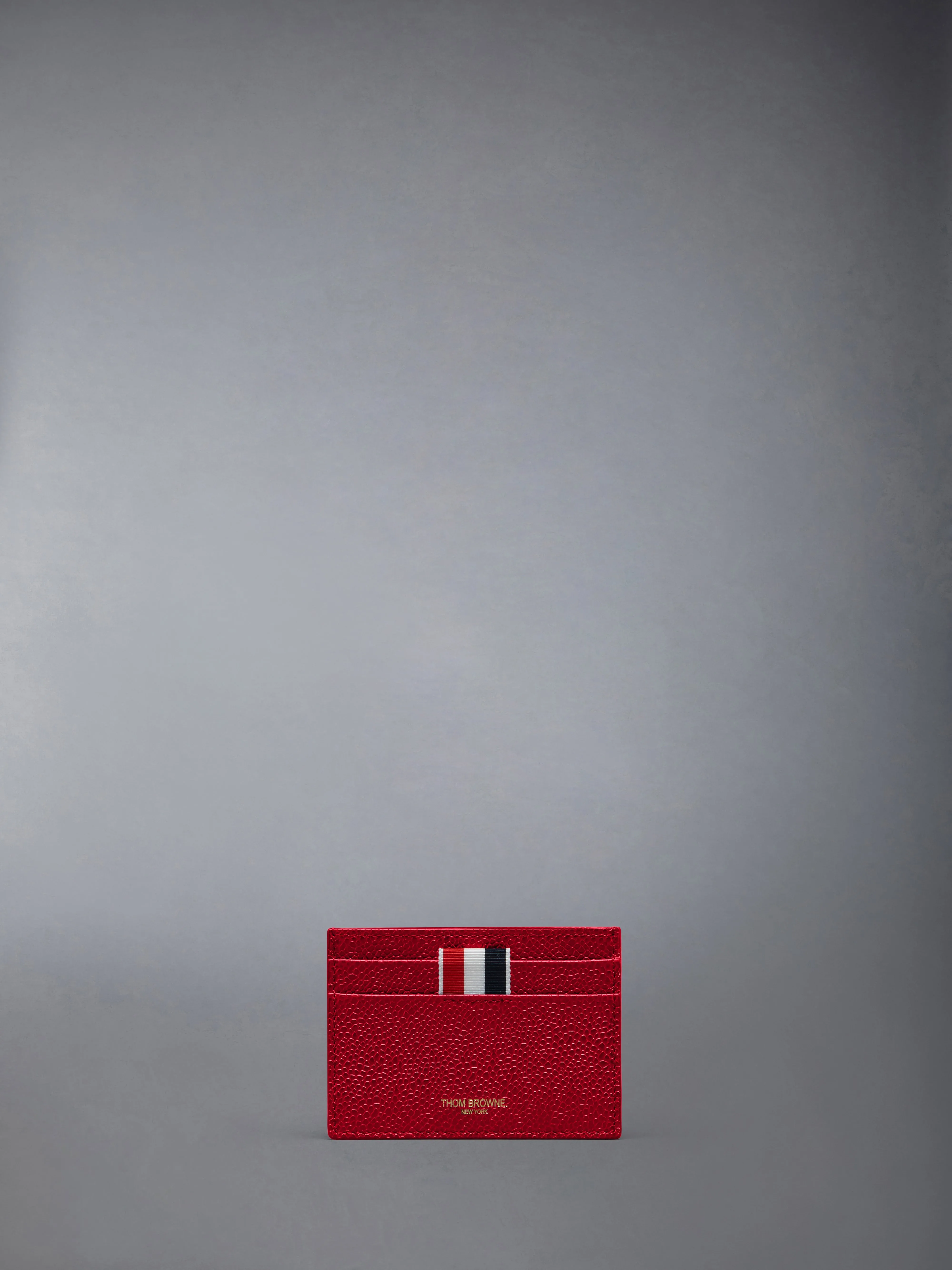 PEBBLE GRAIN LEATHER SINGLE CARD HOLDER sold by Thom Browne