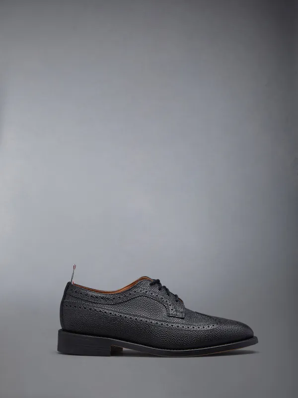 PEBBLE GRAIN LEATHER SOLE LONGWING BROGUE sold by Thom Browne