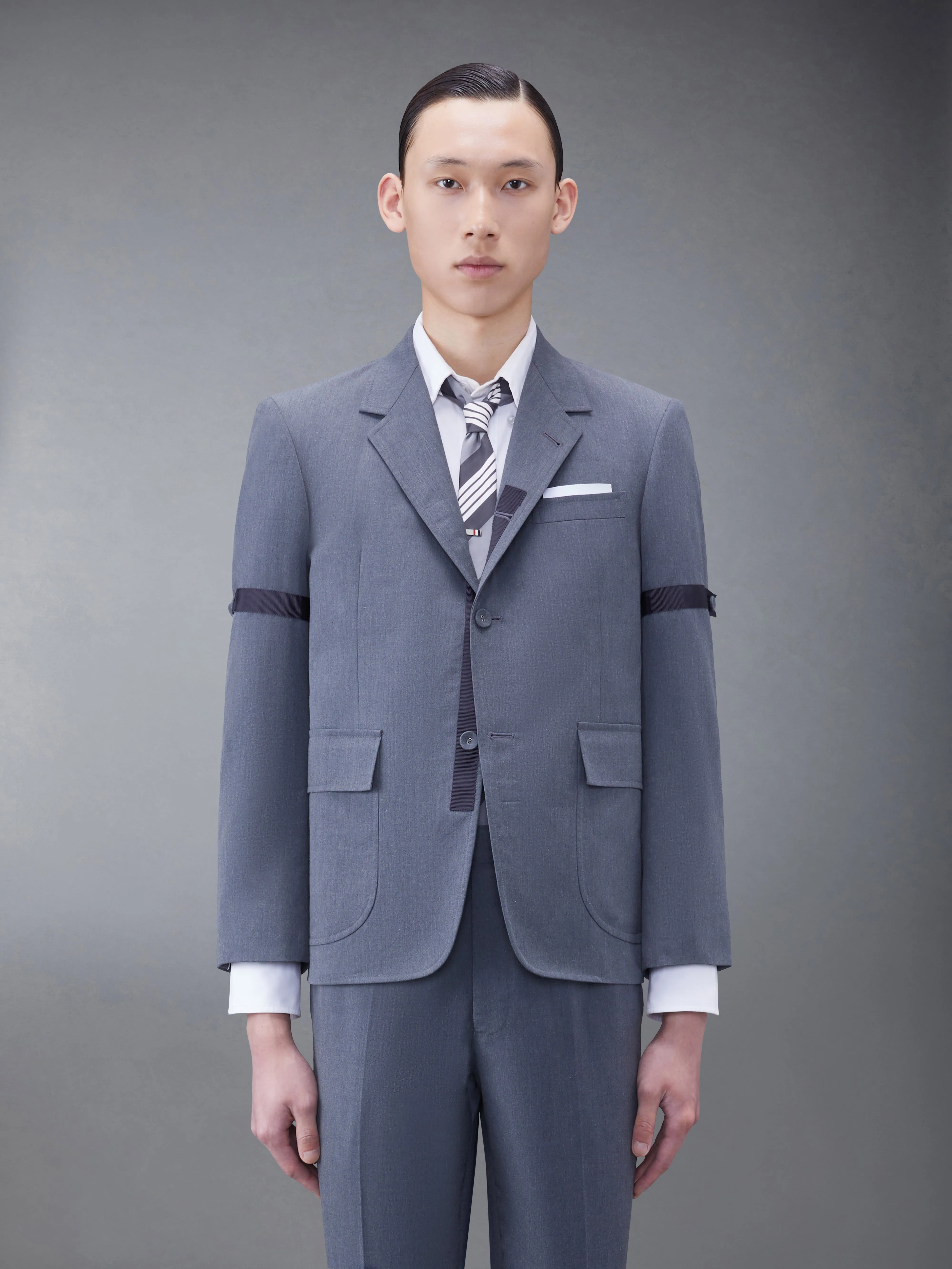 TYPEWRITER CLOTH ARMBAND SPORT COAT sold by Thom Browne