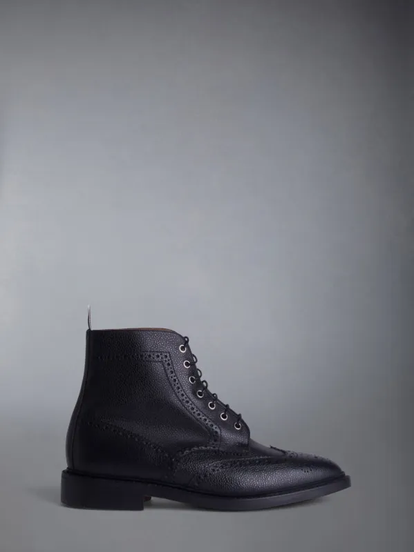 WINGTIP BROGUE BOOTS sold by Thom Browne