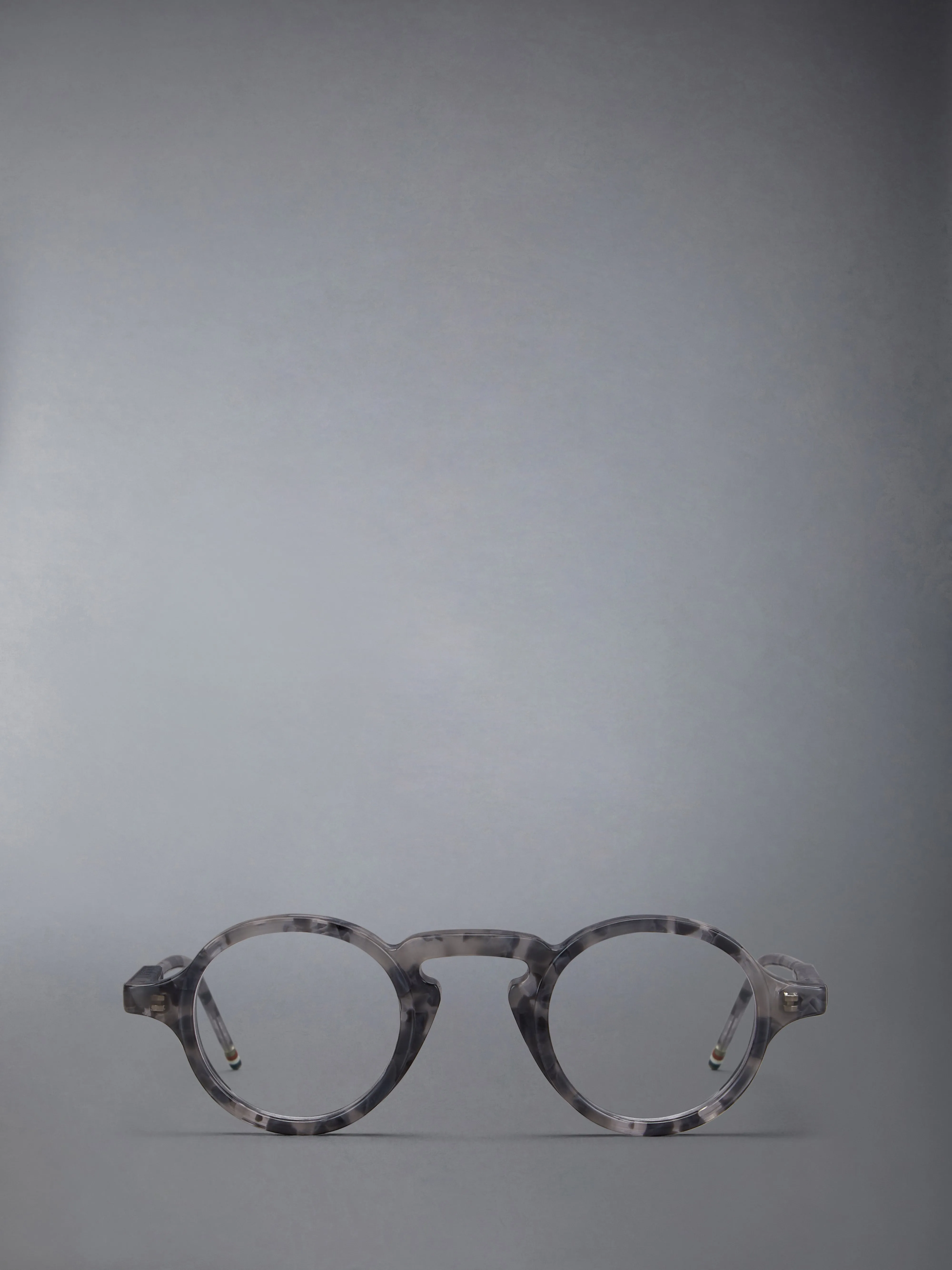 ACETATE ROUND EYEGLASSES sold by Thom Browne
