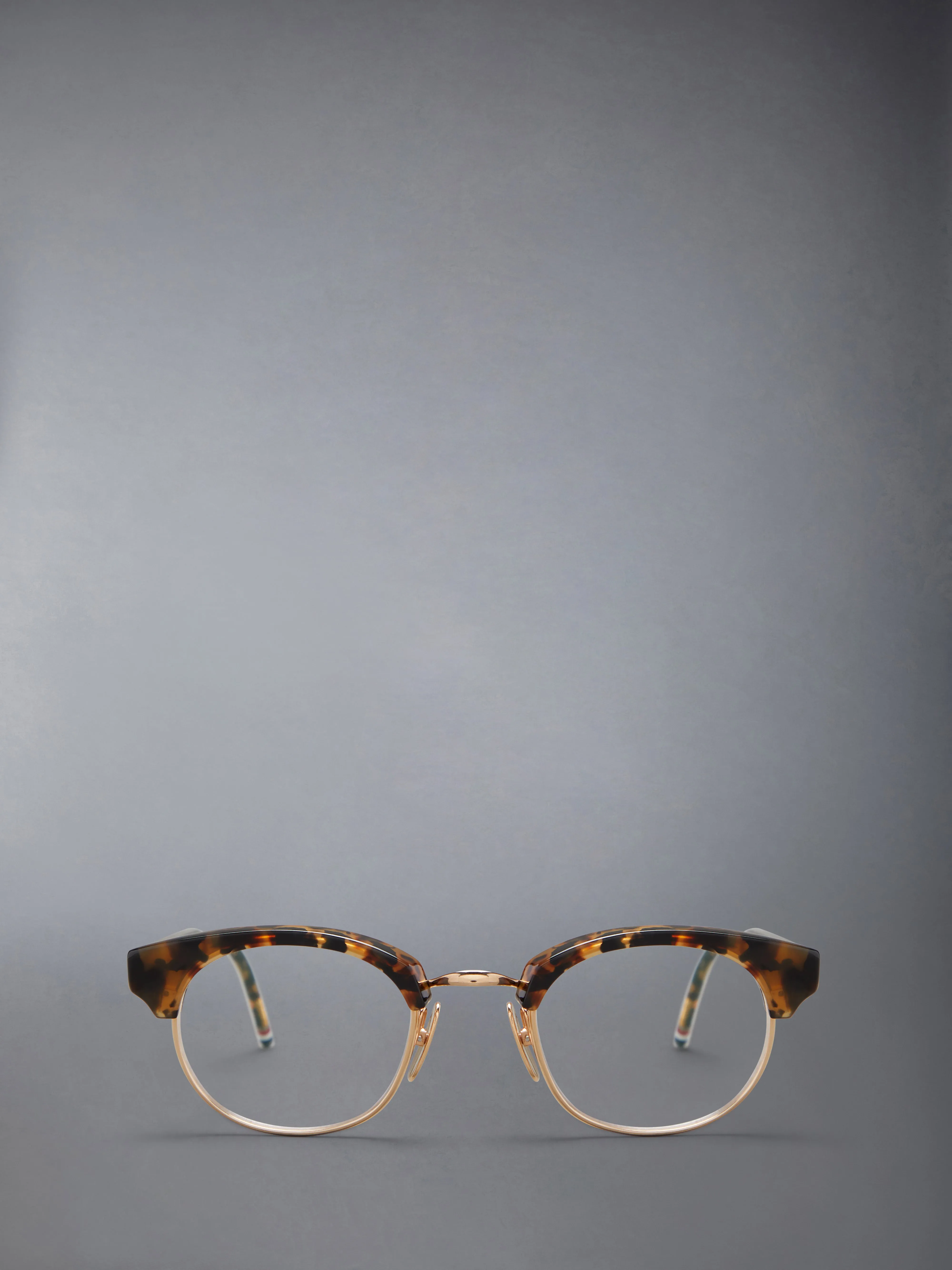 ACETATE AND TITANIUM OVAL EYEGLASSES sold by Thom Browne