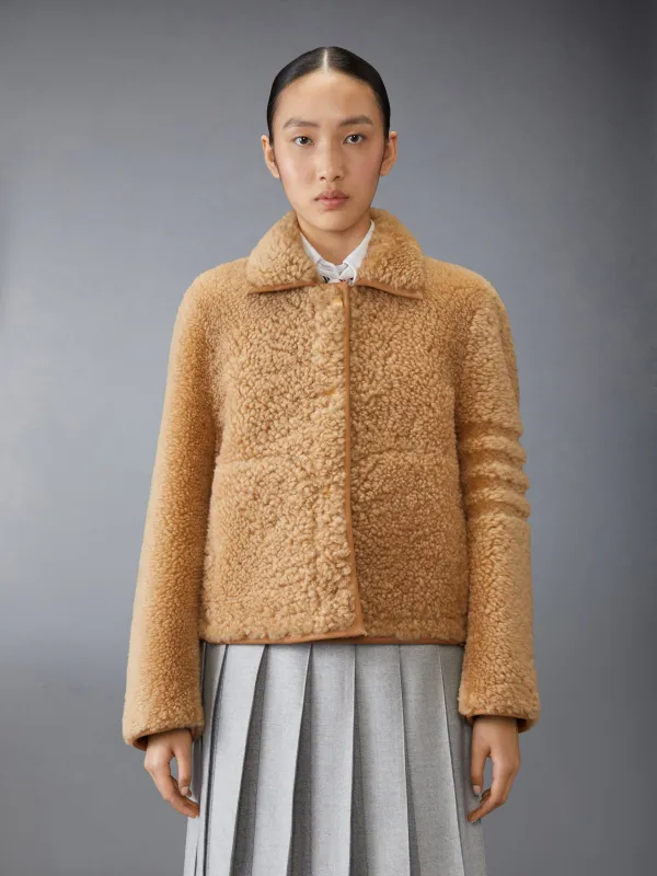SHEARLING BELL SLEEVE JACKET sold by Thom Browne