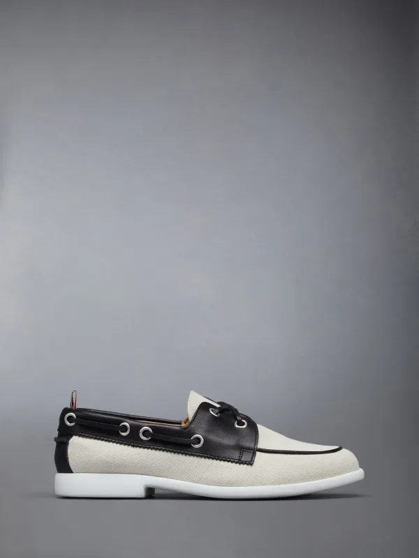 COTTON CANVAS BOAT SHOE sold by Thom Browne