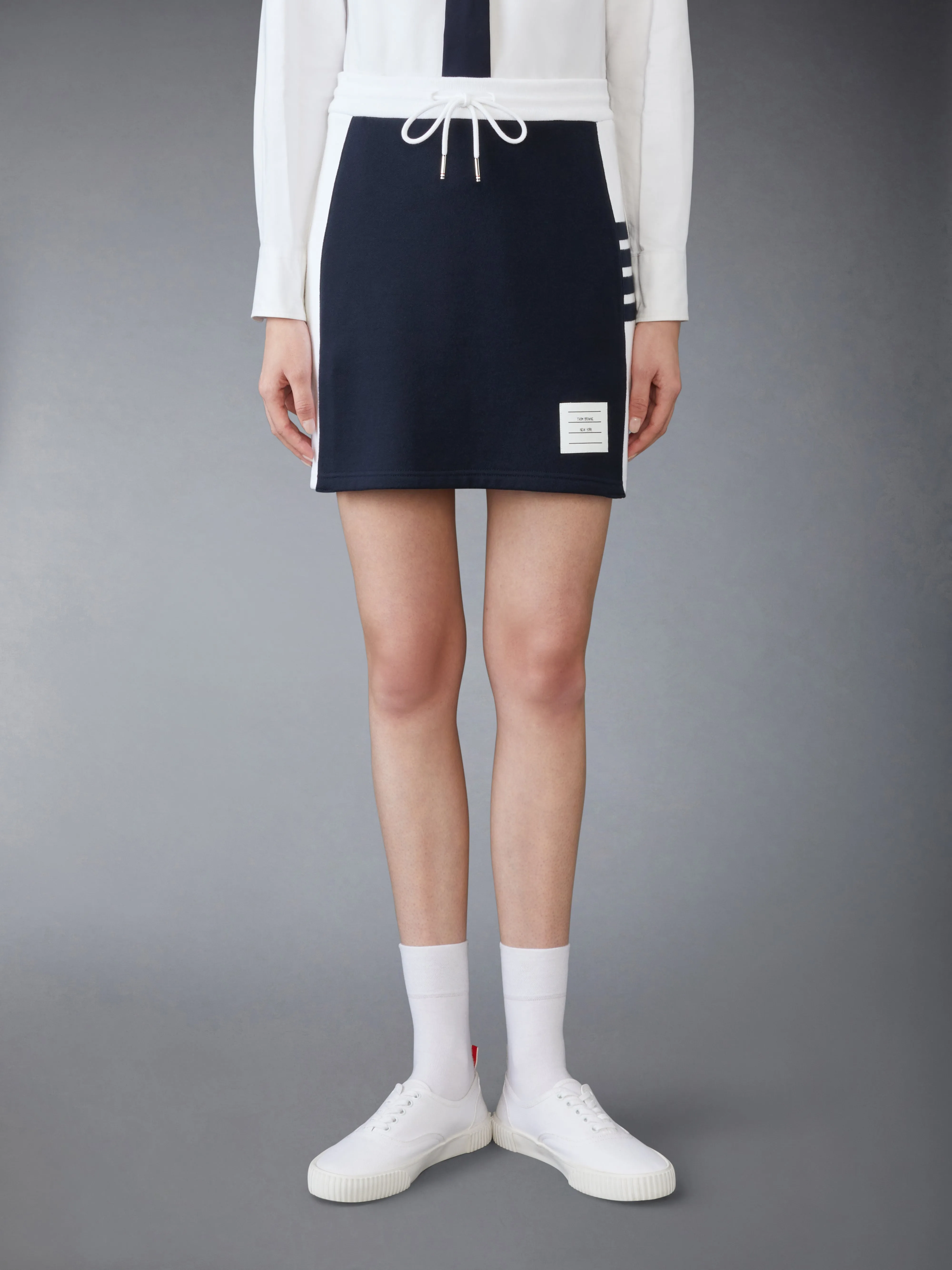 CLASSIC 4-BAR JERSEY MINI SKIRT sold by Thom Browne