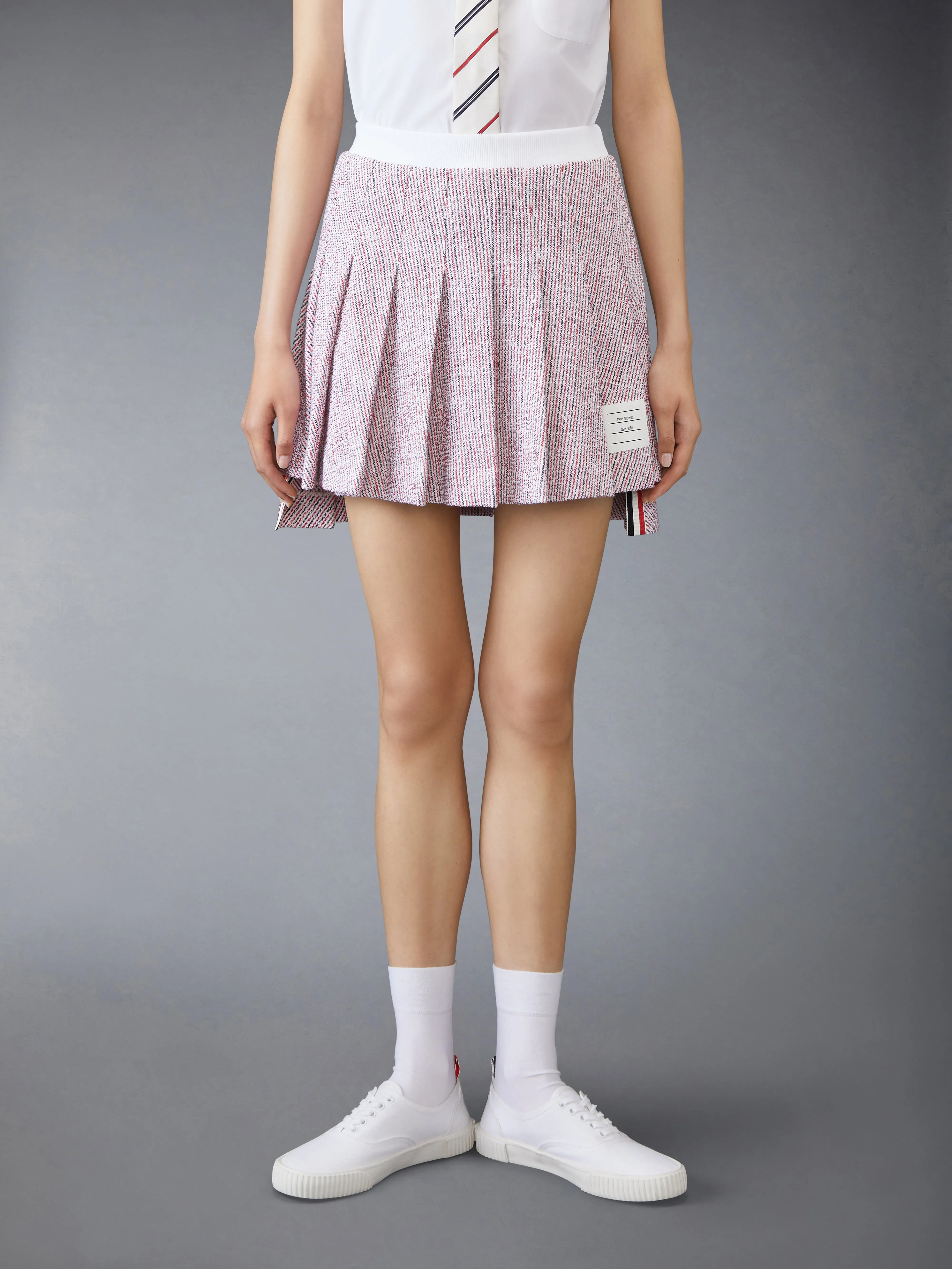 COTTON TWEED MINI PLEATED SKIRT sold by Thom Browne