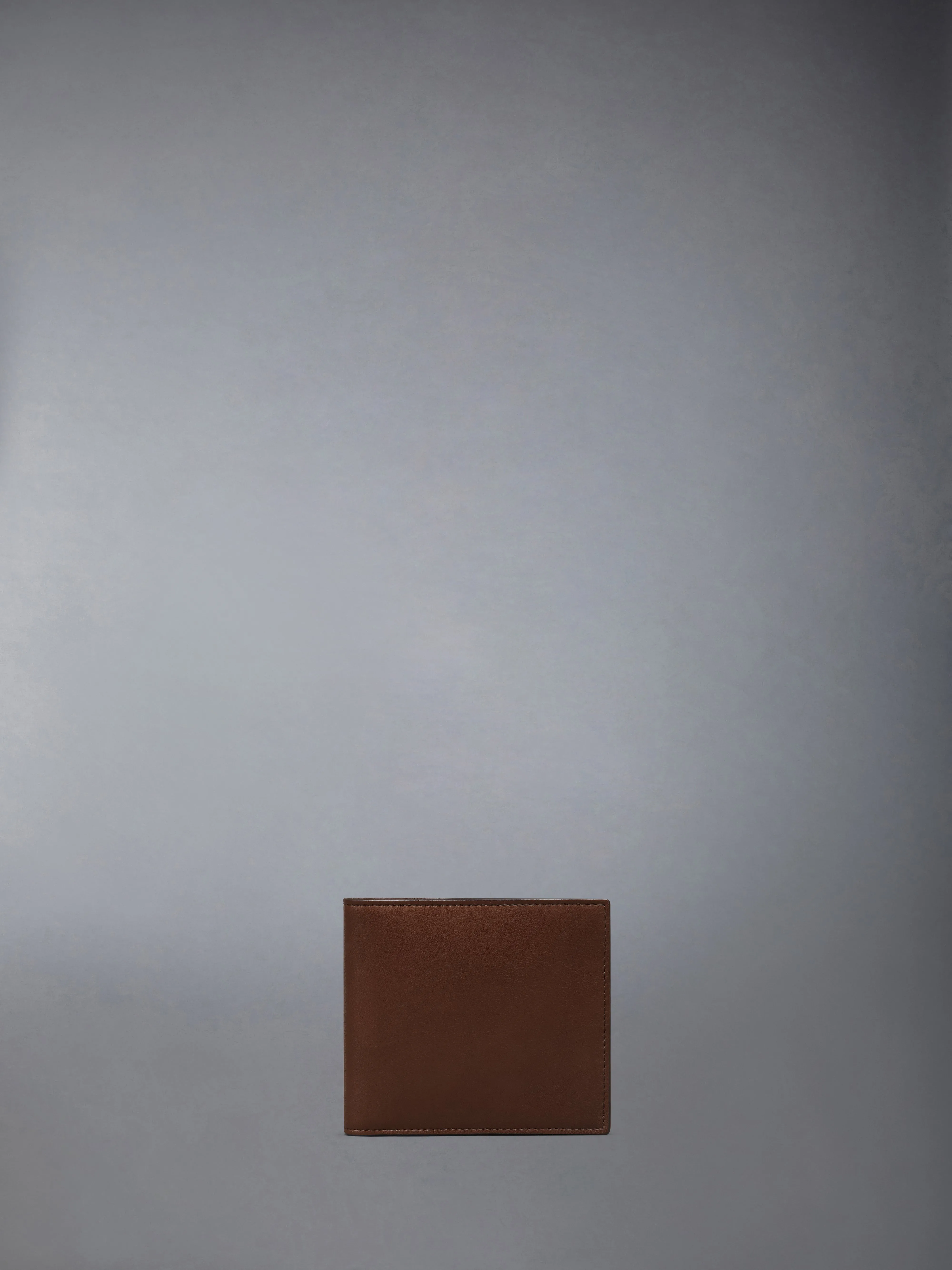 SOFT CALF LEATHER BILFOLD WALLET sold by Thom Browne