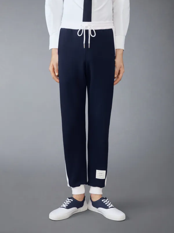 CLASSIC 4-BAR JERSEY LOOPBACK SWEATPANTS sold by Thom Browne