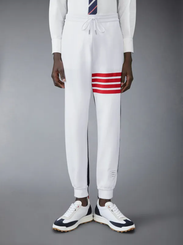 COTTON COLOR BLOCK SWEATPANTS sold by Thom Browne