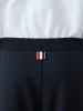 COTTON COLOR BLOCK SWEATPANTS sold by Thom Browne