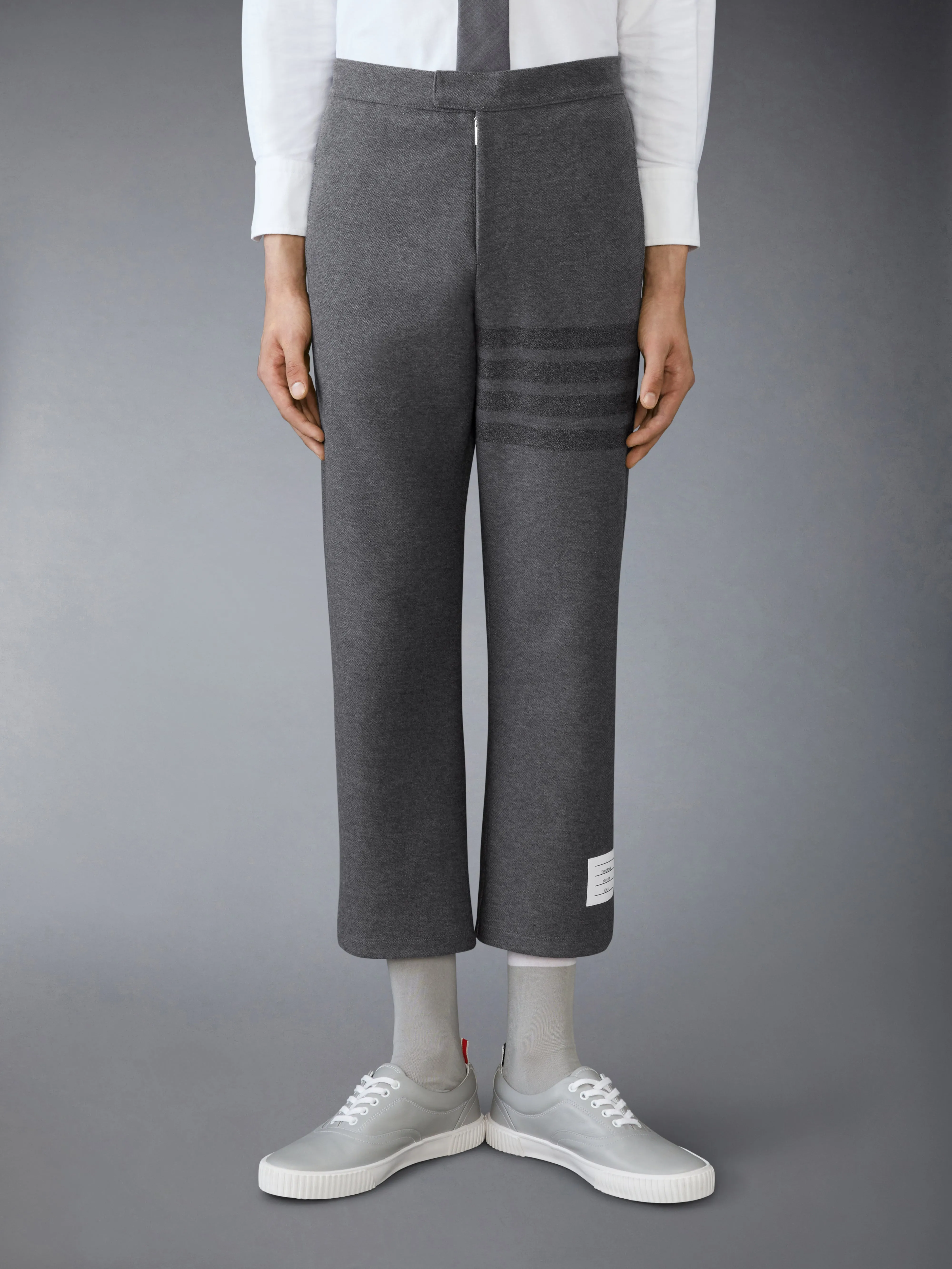 DOUBLE FACE TECH TWILL 4-BAR TROUSERS sold by Thom Browne