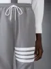 RIPSTOP 4-BAR TRACK PANTS sold by Thom Browne