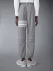 RIPSTOP 4-BAR TRACK PANTS sold by Thom Browne