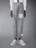 RIPSTOP 4-BAR TRACK PANTS sold by Thom Browne