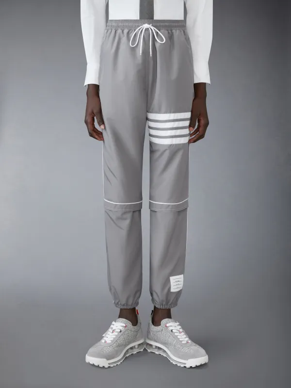 RIPSTOP 4-BAR TRACK PANTS sold by Thom Browne