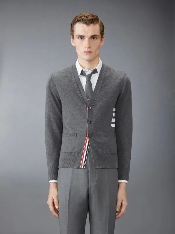 COTTON 4-BAR RELAXED FIT V NECK CARDIGAN sold by Thom Browne