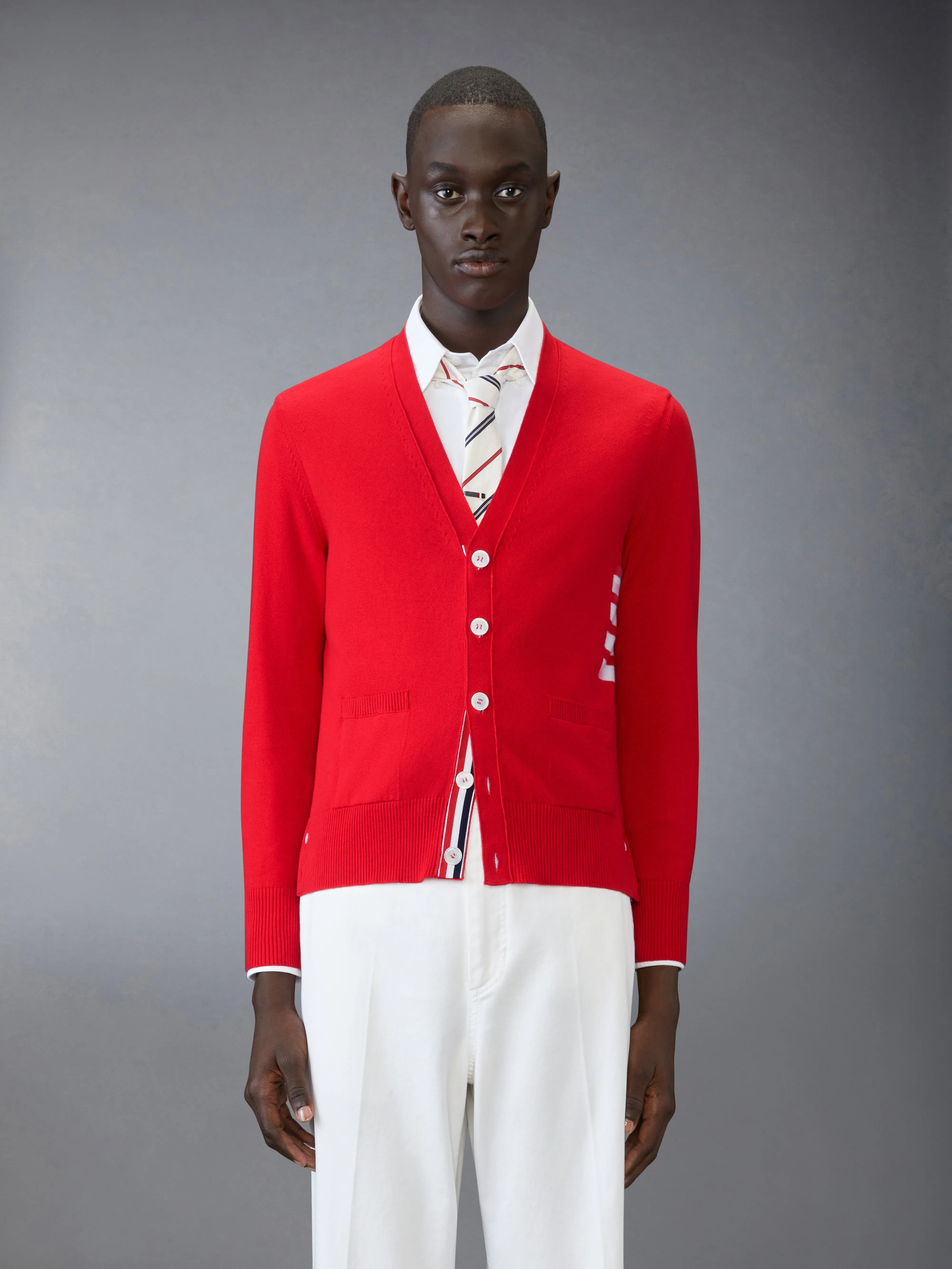 COTTON 4-BAR RELAXED FIT V NECK CARDIGAN sold by Thom Browne