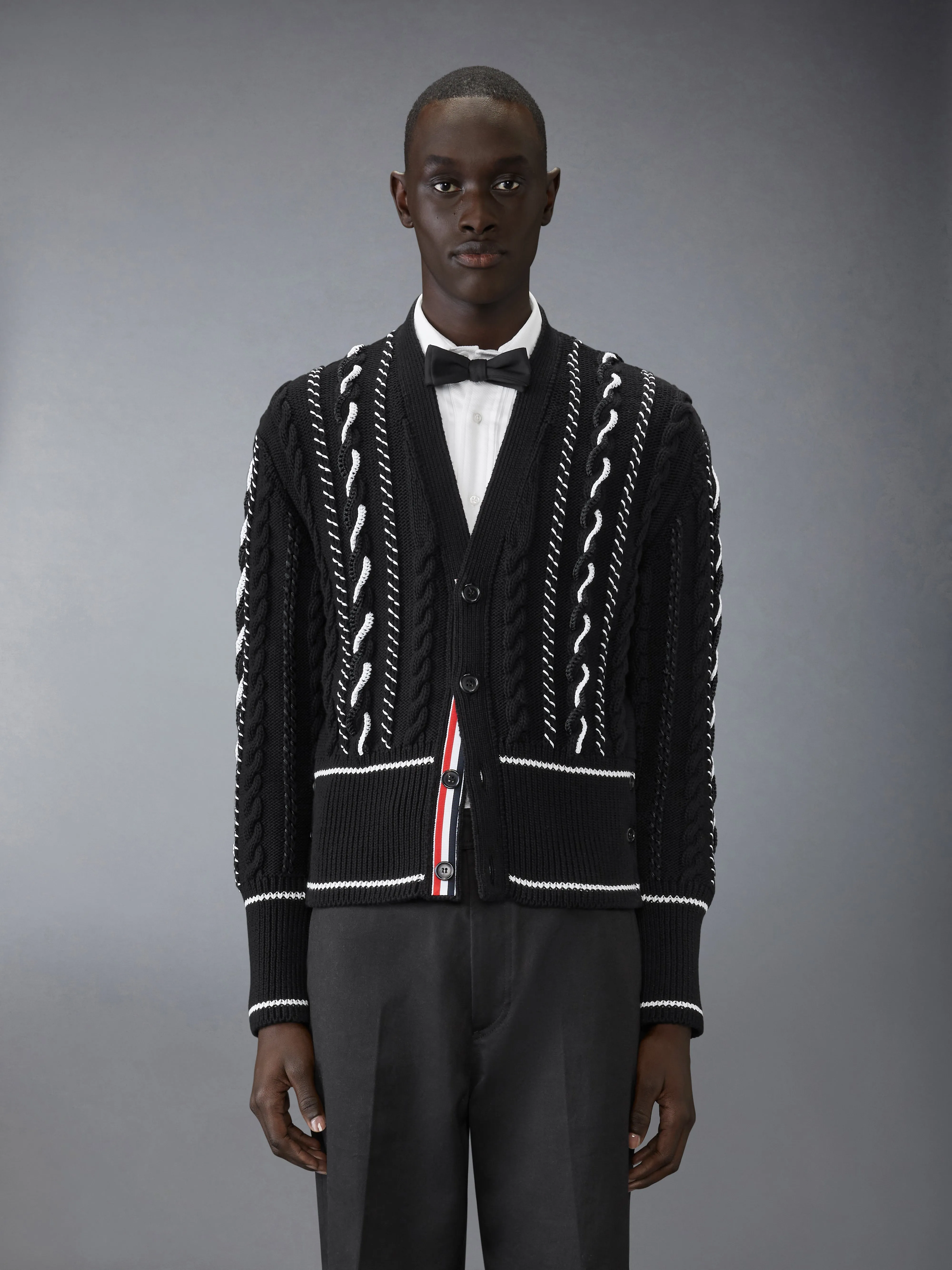 CLASSIC HAND CROCHET CABLE V NECK CARDIGAN sold by Thom Browne