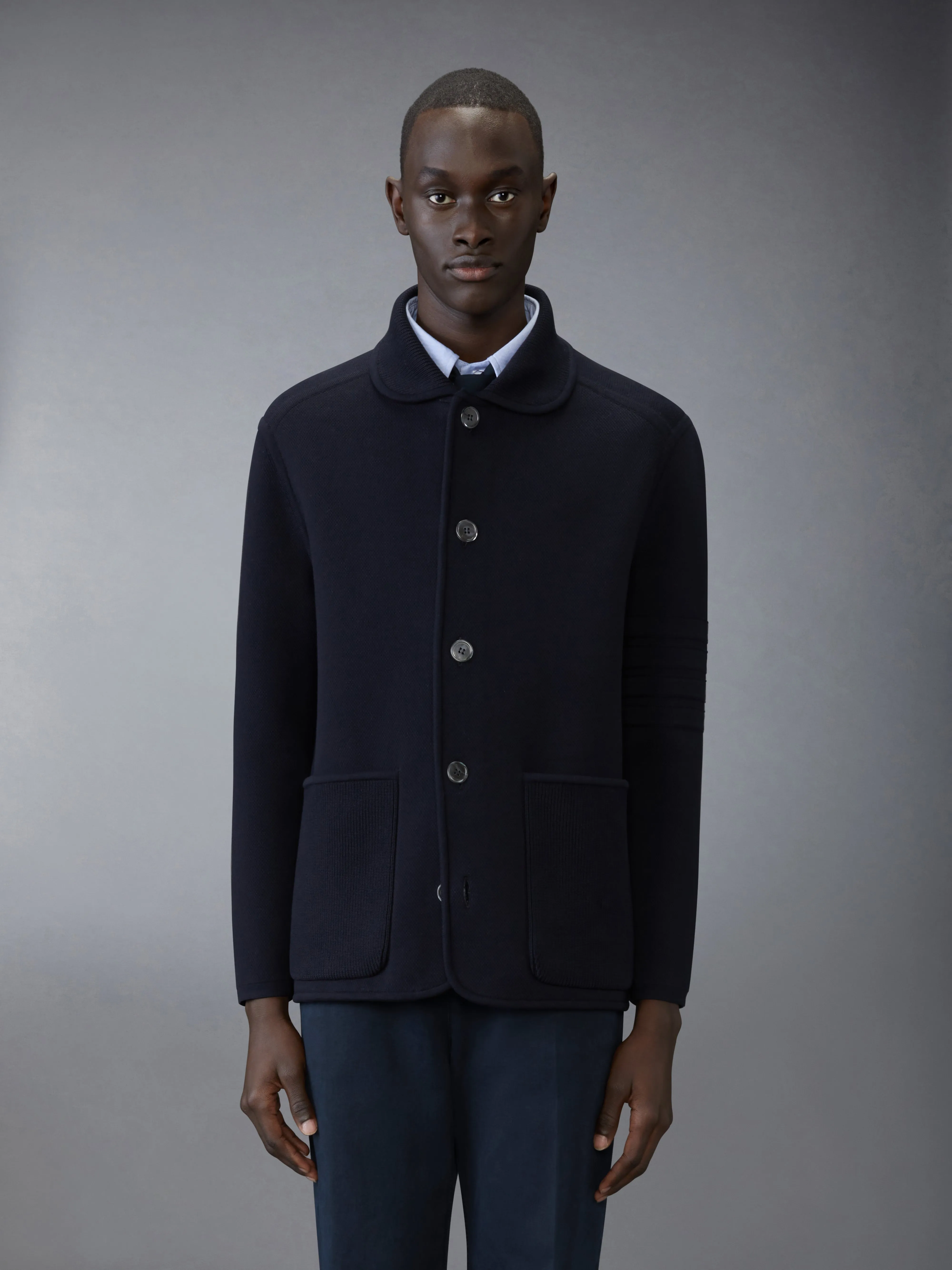 4-BAR POLO COAT sold by Thom Browne
