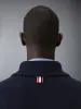 4-BAR POLO COAT sold by Thom Browne