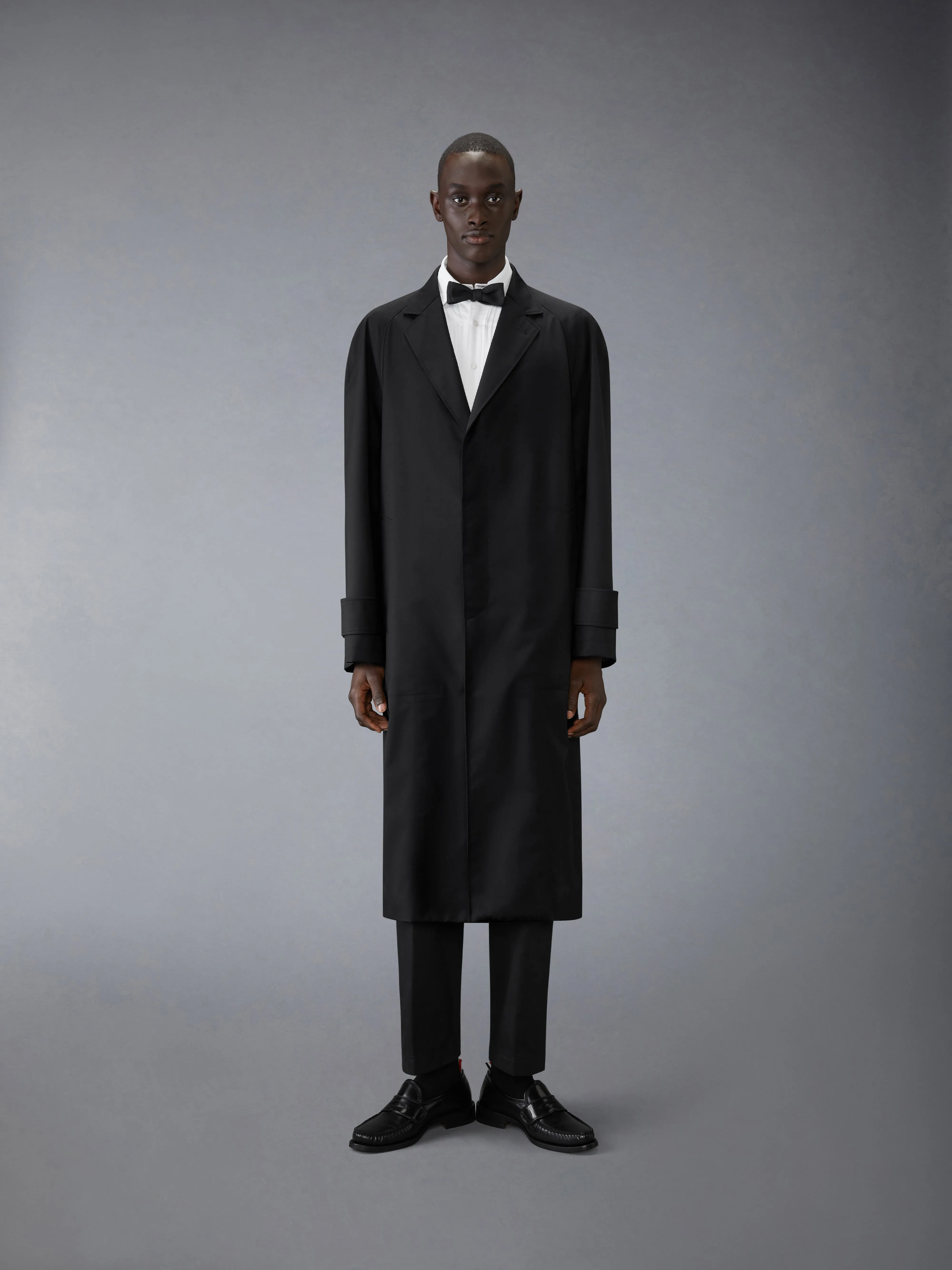 WOOL RAGLAN COAT sold by Thom Browne